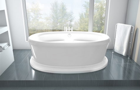 white bath tub on porcelain floor